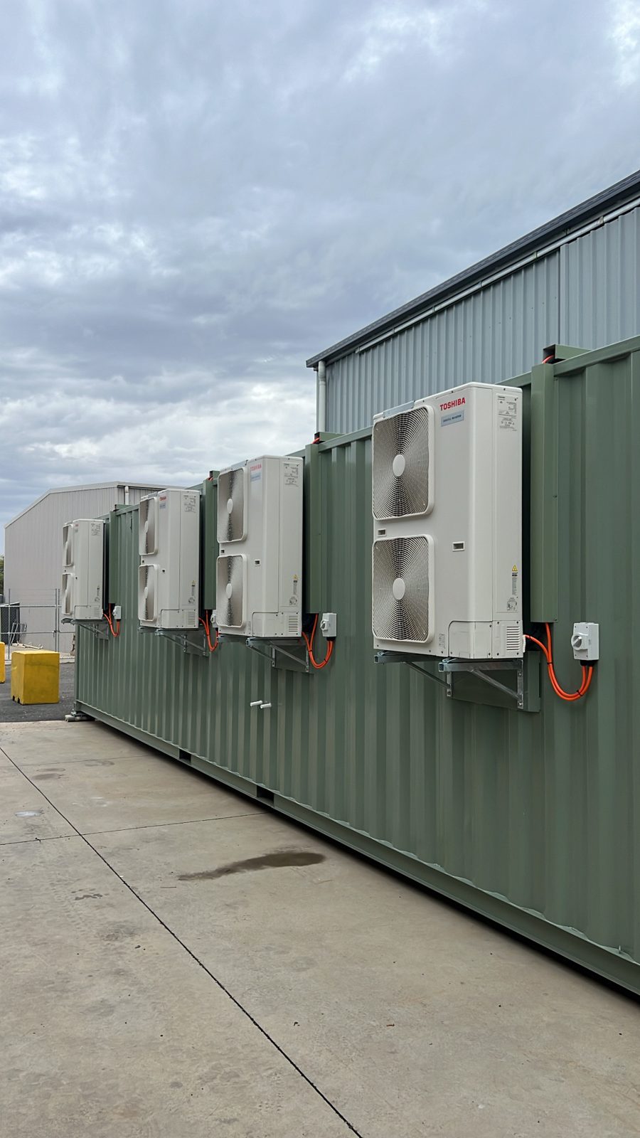 Multi-split condensers along a shed wall