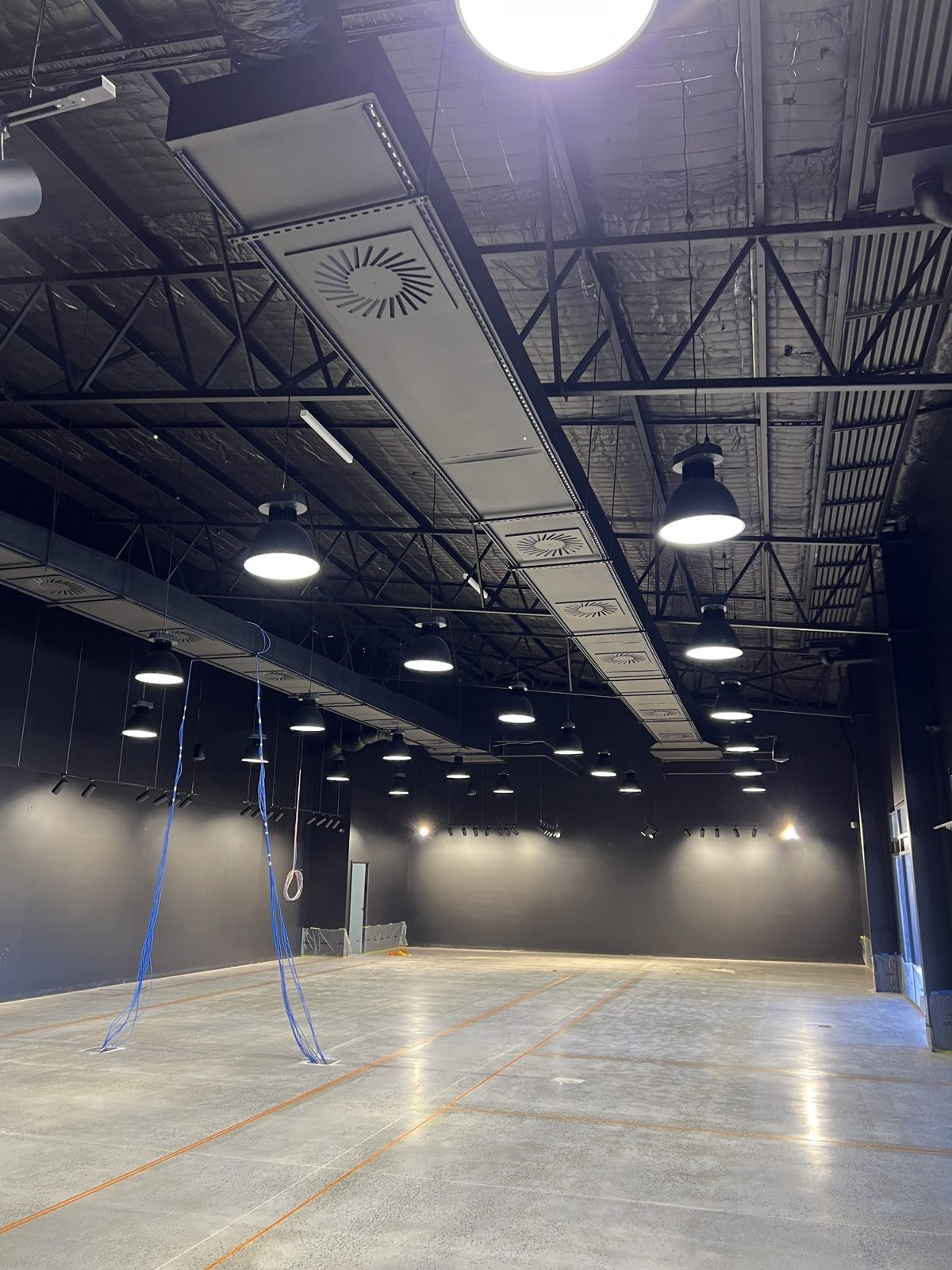 Ducted system pipework inside a light-industrial building